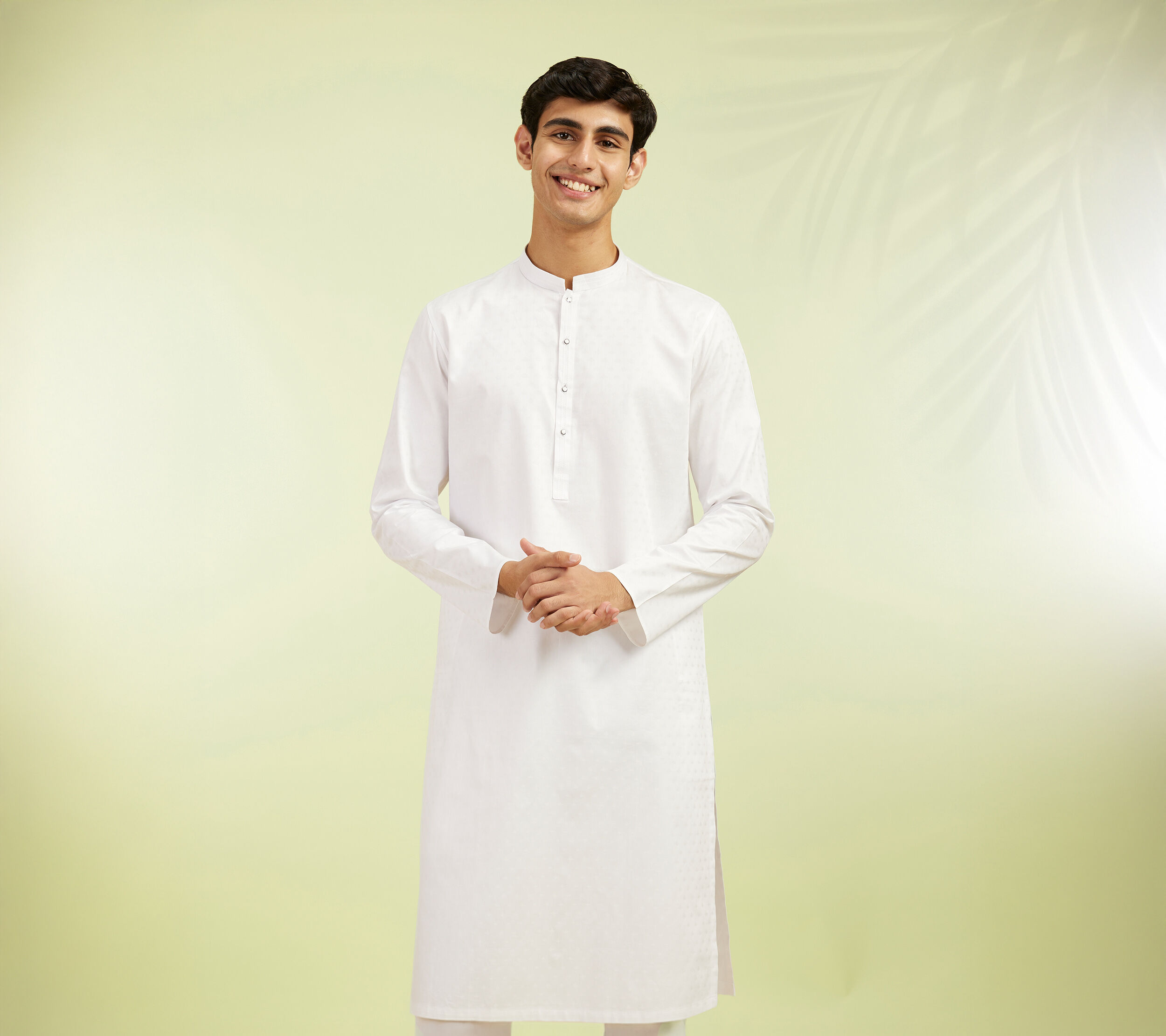 Brother and sister smiling, exchanging beautifully wrapped shagan gifts for the Bhai Dooj festival.